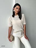Жіночий джемпер з коротким рукавом білого кольору. Модель 42939