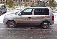 Дефлектори вікон (вітровики) COBRA-Tuning MAZDA DEMIO 1997-2003