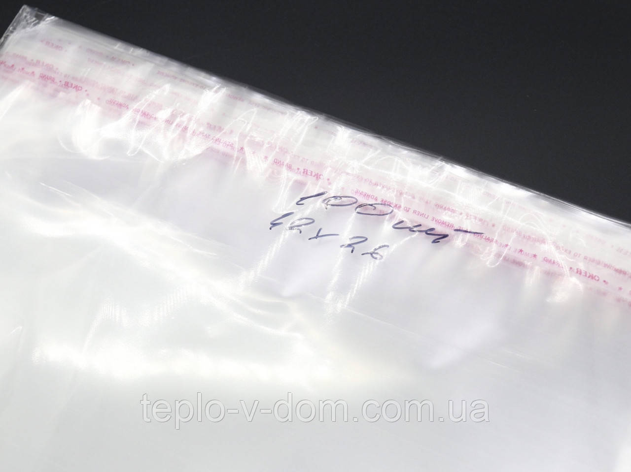 ПП упаковка з липкою смугою 42х26см 25мкм 100шт/уп у закритому вигляді - 37,5х26см прозора, фото 1