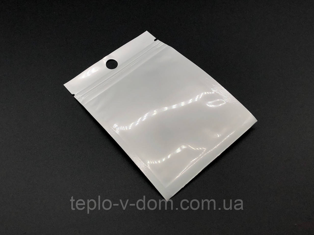 Європакети з ZIP-замком і підвісом Поліпропіленові 7х10 см. . біло-прозорі Зіп-Лок пакет Струна