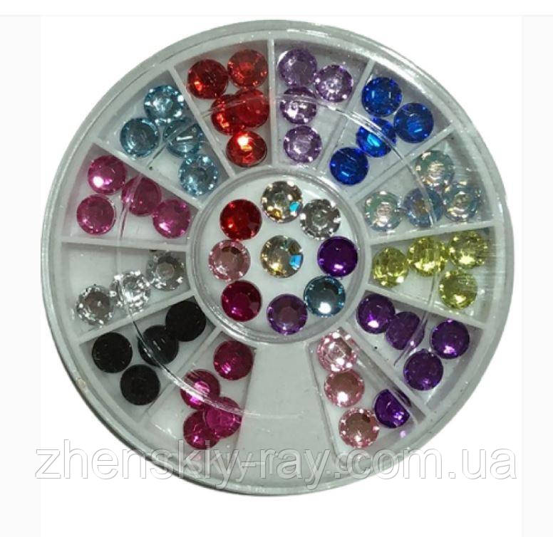 Різнокольорові стрази в карусельці