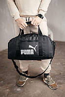 Дорожня сумка шкірозамінник у чорному кольорі з логотипом Пума, стильна та зручна для коротких і тривалих подорожі