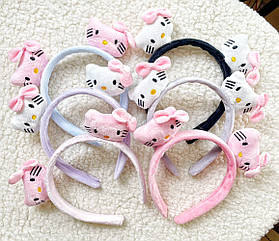 Обручі для волосся дитячі пластик/текстиль 12 шт./пач. КІТІ