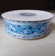 Стрічка 2.5 см ажурна блакитна "клевер" 1моток=23м