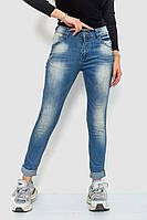 Синие женские джинсы скинни с потертостями и средней посадкой