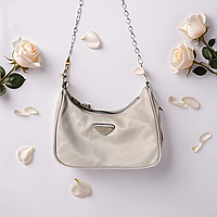 Красивая универсальная женская брендовая сумочка Prada прада нейлоновая бежевая на цепочке с ремнем