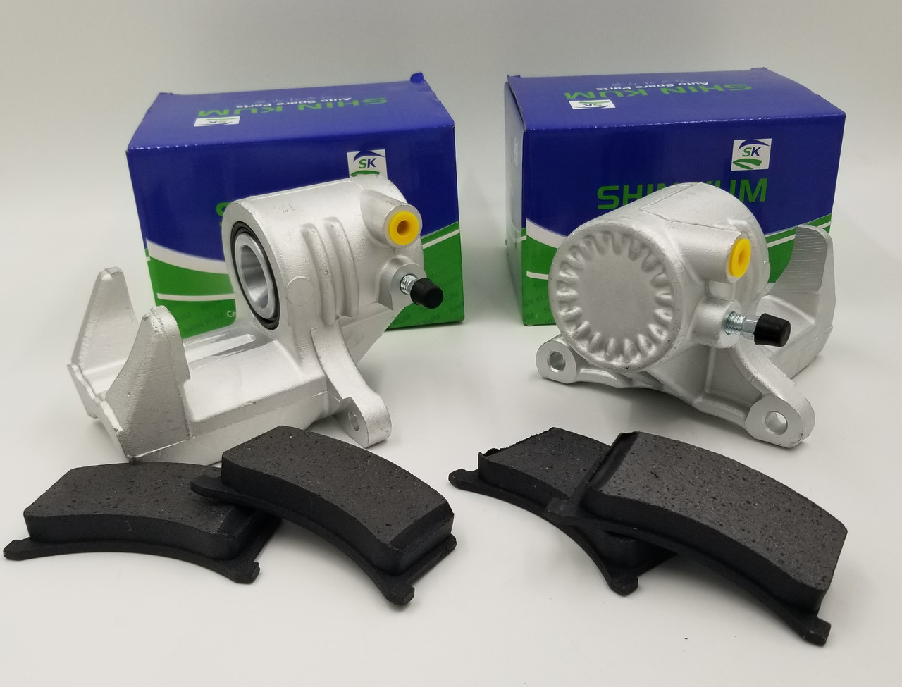 Супорт Таврія, Славута з колодками (комплект лівий + правий + колодки) Shin Kum Корея