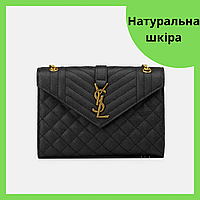 Женская сумка конверт Yves Saint Laurent из натуральной кожи черная с ручкой-цепочкой