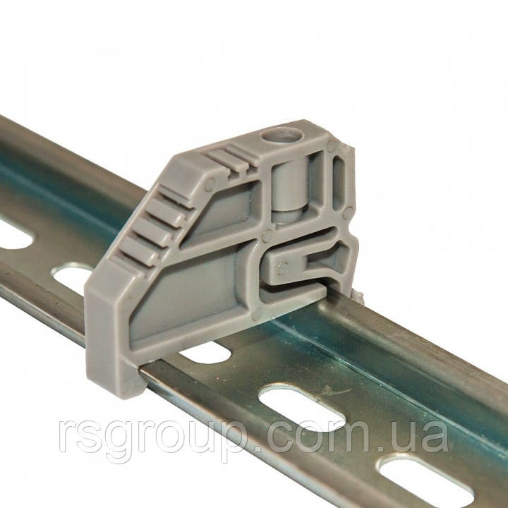 Фіксатор на DIN рейку пластиковий СT