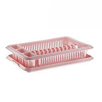 Рожева пластикова сушарка для посуду з осередками для сушіння столових приладів та зливним піддоном