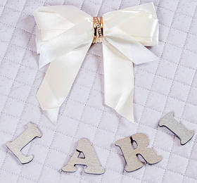 Бантік - пов'язка для дитячого конверта на гумці Lari Молочний