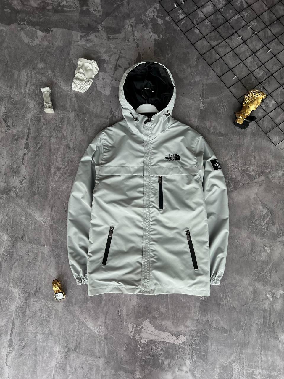 Чоловіча куртка вітровка The North Face M1830 світло-сіра