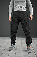 Зручні чоловічі спортивні штани на манжетах з кишенями чорні