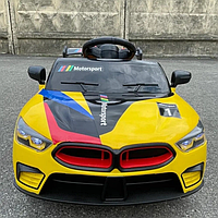 Електричний автомобіль у стилі BMW M8 від Kidsauto, Жовта дитяча машинка