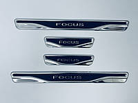 Накладки на пороги Ford Focus 1 1998-2004 (нерж.+карбон) TAN24