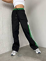 Женские комбинированные джинсовые брюки спортивного кроя с лампасами и низом на кулиске Цвет Чёрно-Зелёный
