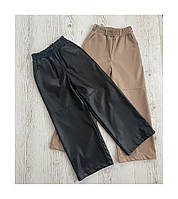Детские брюки палаццо эко кожа, чёрные кожаные для девочки 6 7 8 9 10 лет
