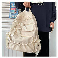 Шкільний рюкзак із бантиками для дівчинки красивий зручний місткий бежевого кольору