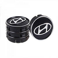 Заглушка колесного диска Hyundai 60x55 черный ABS пластик (4шт.) 50939 (50939) KM