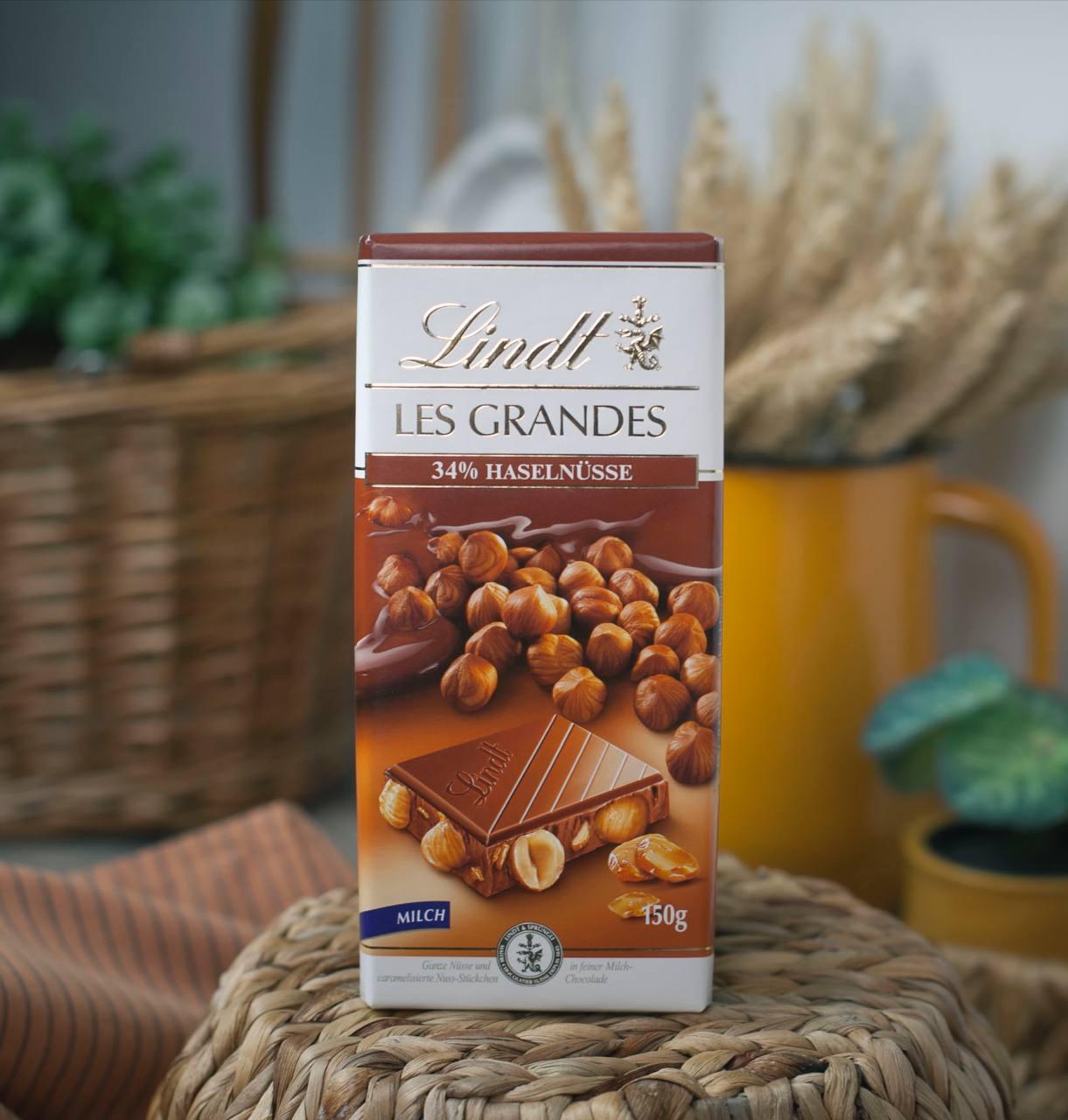 Шоколад молочний з цілим горіхом Lindt Les Grandes Haselnusse 150 г. Швейцарія, фото 1