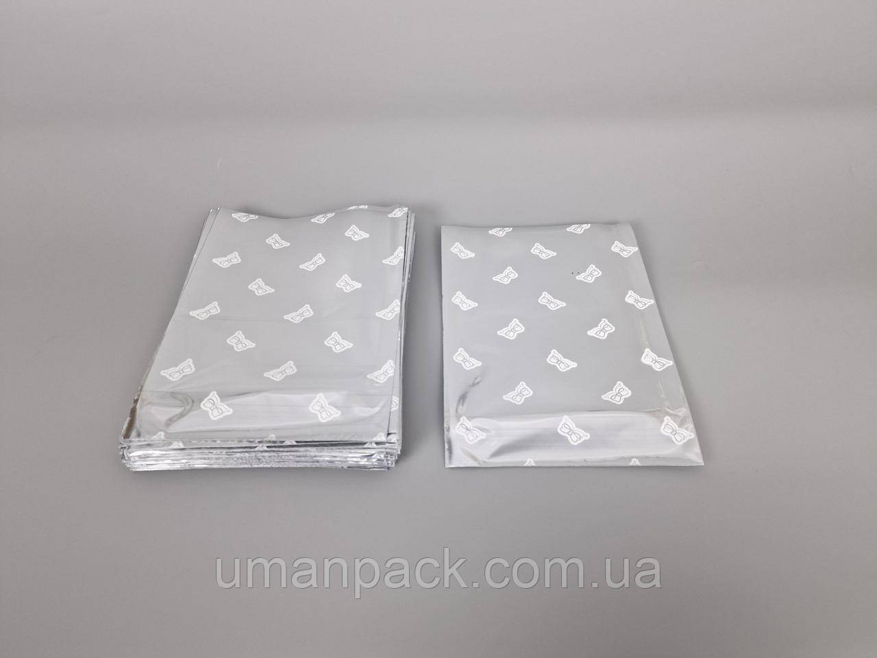 Пакет із малюнком для пакування подарунків (15*20) No413 (1) фольгований "Бантик" (100 шт.)