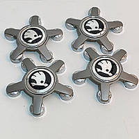 Ковпачок на титани Skoda (135/57 мм) чорн/хром. краб/зірка 1 штука