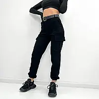 Женские демисезонные вельветовые штаны с карманами в черном цвете 48