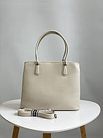 Женская сумка на плечо бежевая из искусственной эко кожи итальянского бренда Gilda Tohetti.