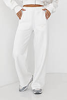 Утеплені трикотажні штани з кишенями — молочний колір, M (є розміри)