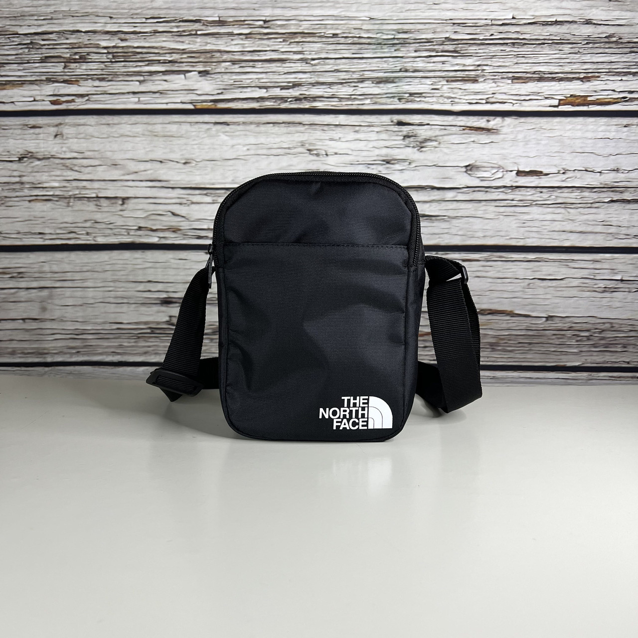 Маленька барсетка TNF маленька чорного кольору