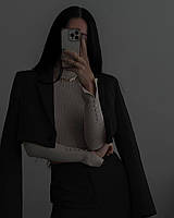 Женский костюм по цене 750 грн доступен в двух размерах: 42-44 и 44-46. Изготовлен из эко-кожи, в цветах черн Черный, 42/44