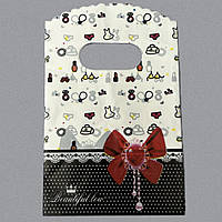 Пакет поліетиленовий подарунковий двоколірний з червоним бантиком і малюнками розмір 15х9 см паковання 50 штук