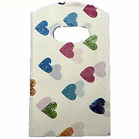 Пакет поліетиленовий подарунковий лимонного кольору з різнобарвними сердечками розмір 15х9 см паковання 50 штук