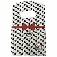 Пакет поліетиленовий подарунковий білого кольору в чорний горошок із червоним бантом розмір 15х9 см паковання 50 штук