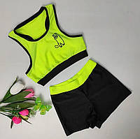 Дитячий спортивний комплект для дівчинки шорти і топ з жовтого біфлексу з термонаклейкою кота Олівія р. 26-44