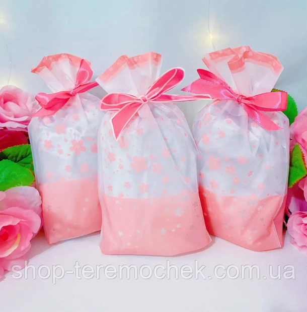 Пакет прозорий з рожевою стрічкою затяжкою Квіти поліетиленовий 23х12см для подарунків і солодощів 1 шт, фото 1