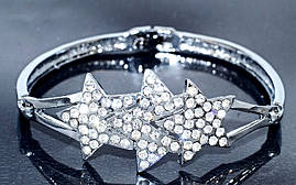 Браслет. Родій. Камені: білий циркон. Діаметр: 6 см. Ширина: 20 мм.