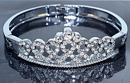 Браслет. Родій. Камені: білий циркон. Діаметр: 6,5 см. Ширина: 20 мм.