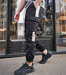 Чоловічі штани демісезонні джоггери спортивні брюки Softshell з кишенями весна-осінь з лампасом. Живе фото