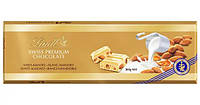 Білий шоколад Lindt Swiss Premium з цілим мигдалем 300 г