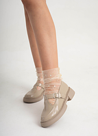 Женские лаковые кожаные туфли с открытым верхом бежевого цвета
