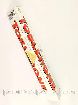 Білий шоколад Toblerone з медово-мигдалевою нугою 100г Швейцарія