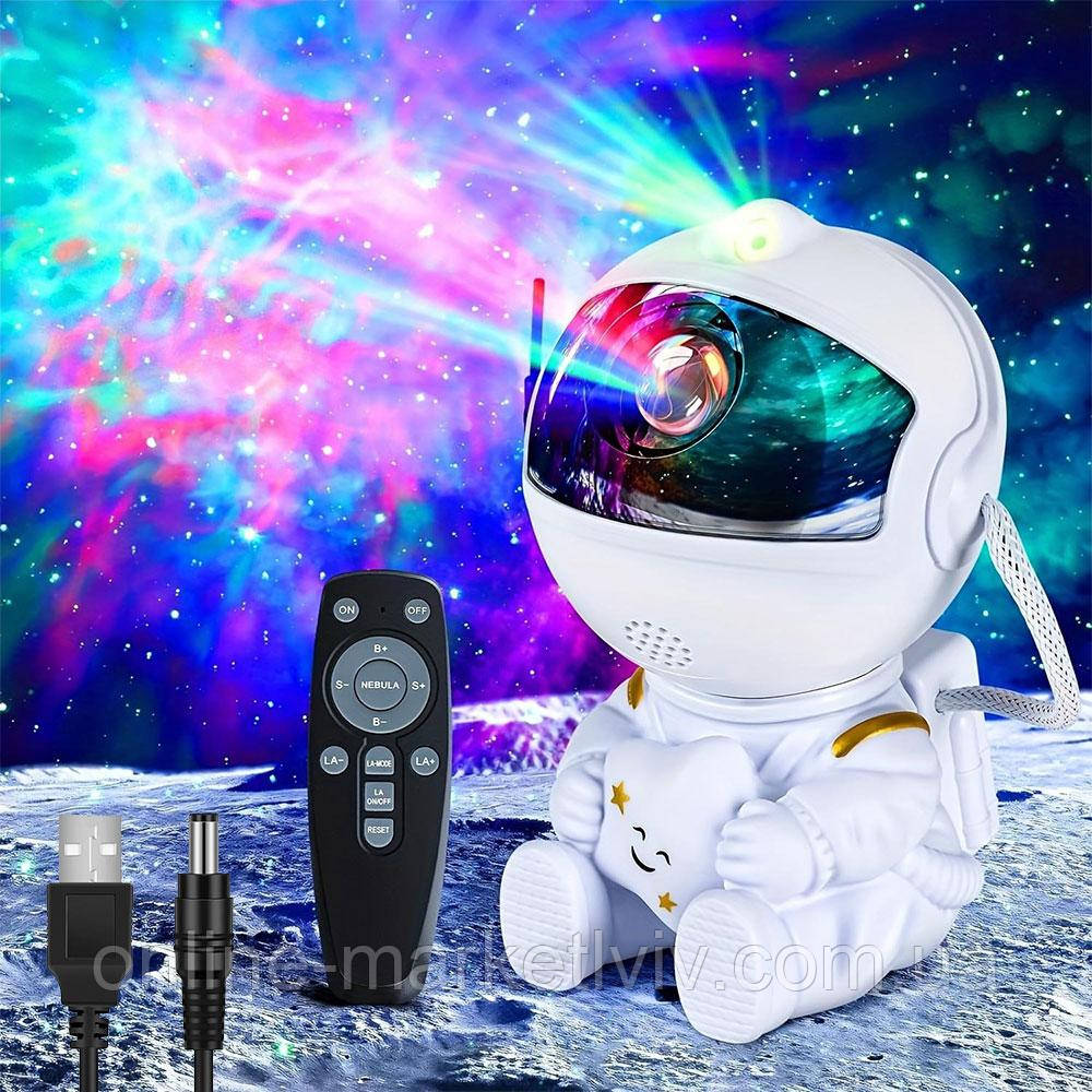 ОПТ 10шт Лазерний нічник-проектор зоряного неба Космонавт, від USB, з пультом / Дитячий світильник з проекцією космосу, фото 1