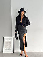 Женская черная юбка миди из эко-кожи с разрезом