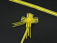 Подарунковий бантик зі стрічки на затяжках для декору та пакування подарунків Колір жовтий. 3х7 см