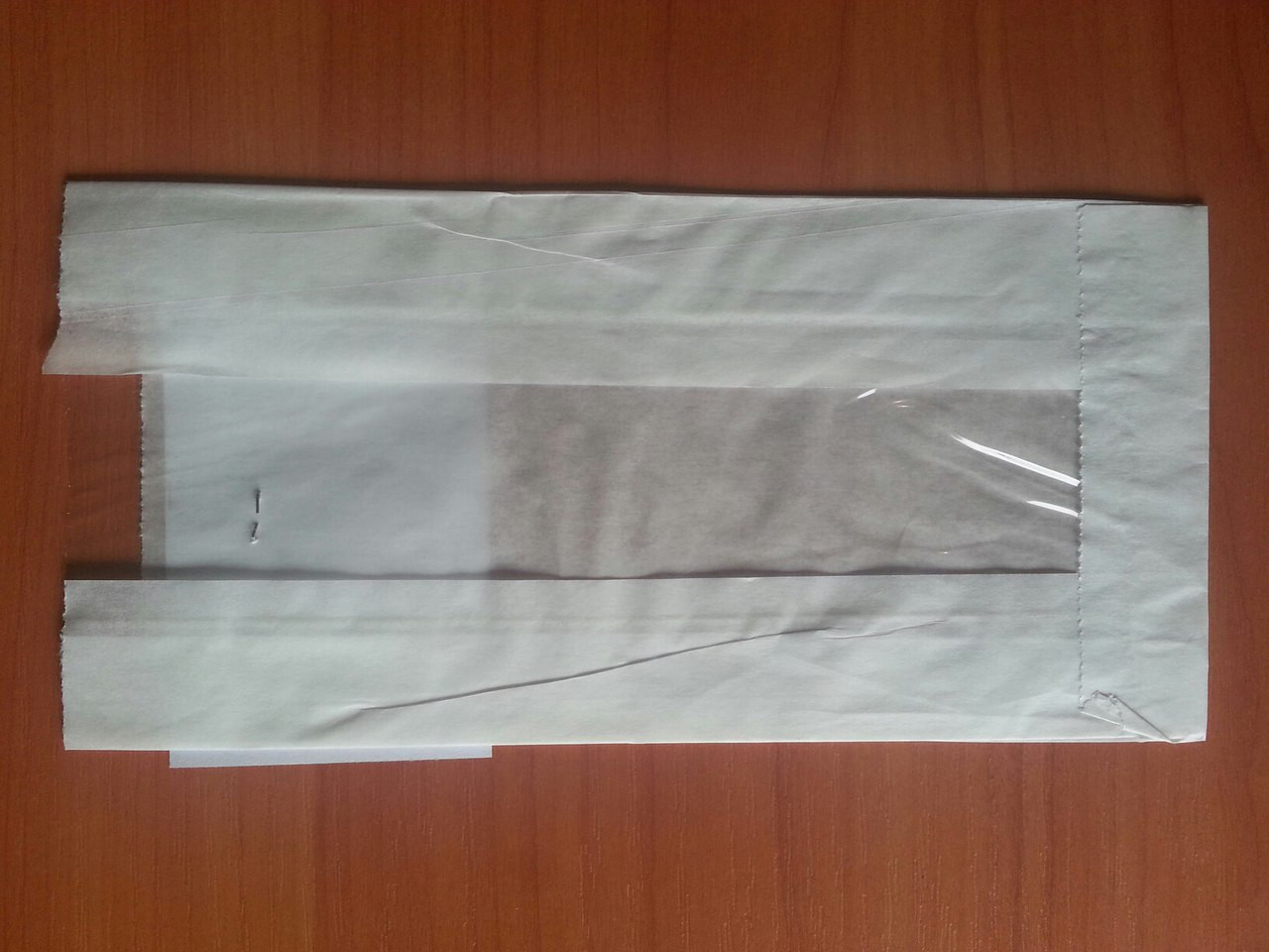 Паперовий пакет з прозорою вставкою 210х100х50/40 мм 69
