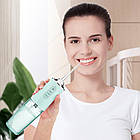 Іригатор Portable Oral Irrigator + Подарунок Зубна електрощітка Shuke / Портативний іригатор для зубів, фото 6