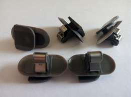 Кліпса (фіксатор, кріплення, защіпка) внутрішніх панелей (обивки) кузова коричнева GM 2228838 9133594 Opel Astra-G Classic Zafira-A Corsa-C Meriva-A