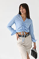 Укорочена блуза з куліскою вздовж пілочки — блакитний колір, M (є розміри)
