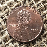 1 цент 2000 року. (D) США